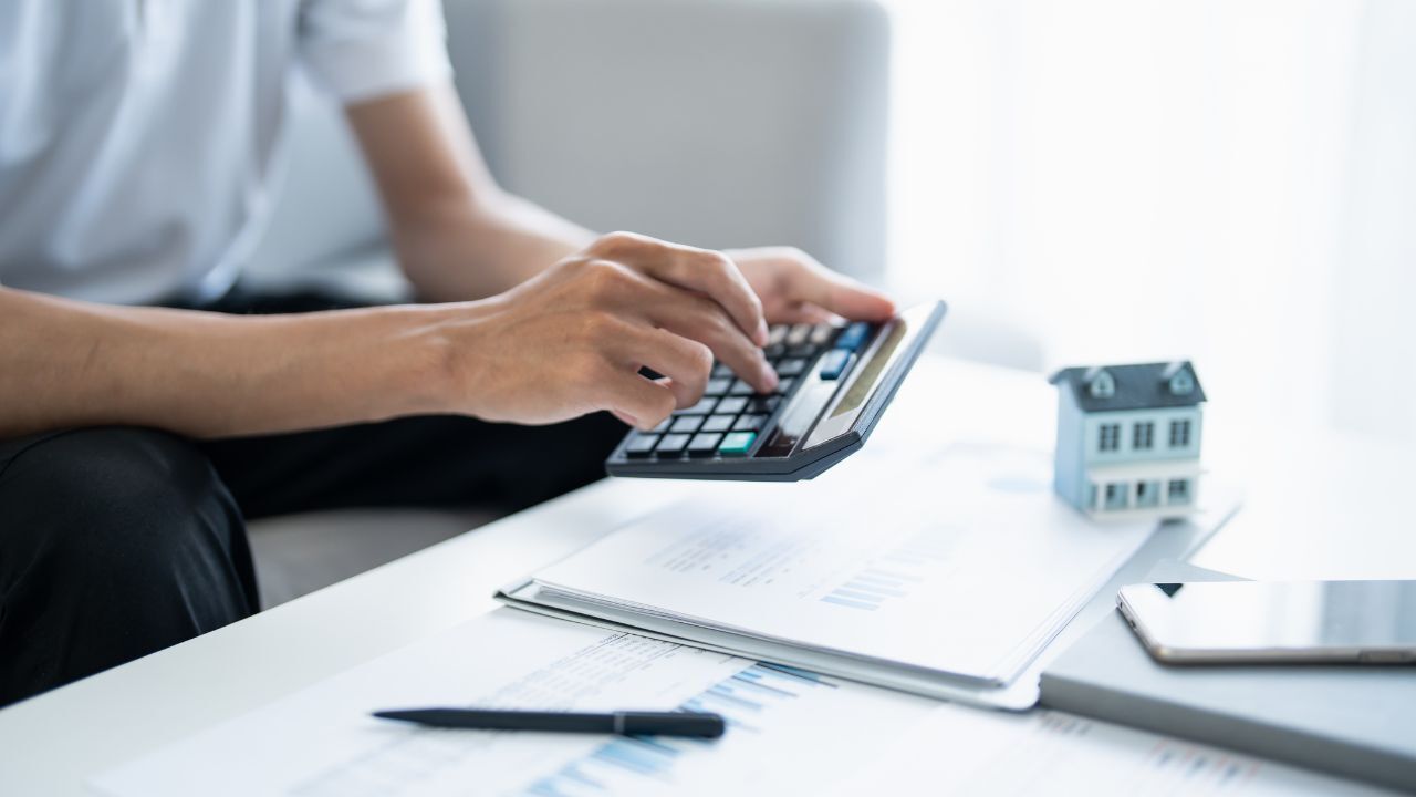 A person using a calculator